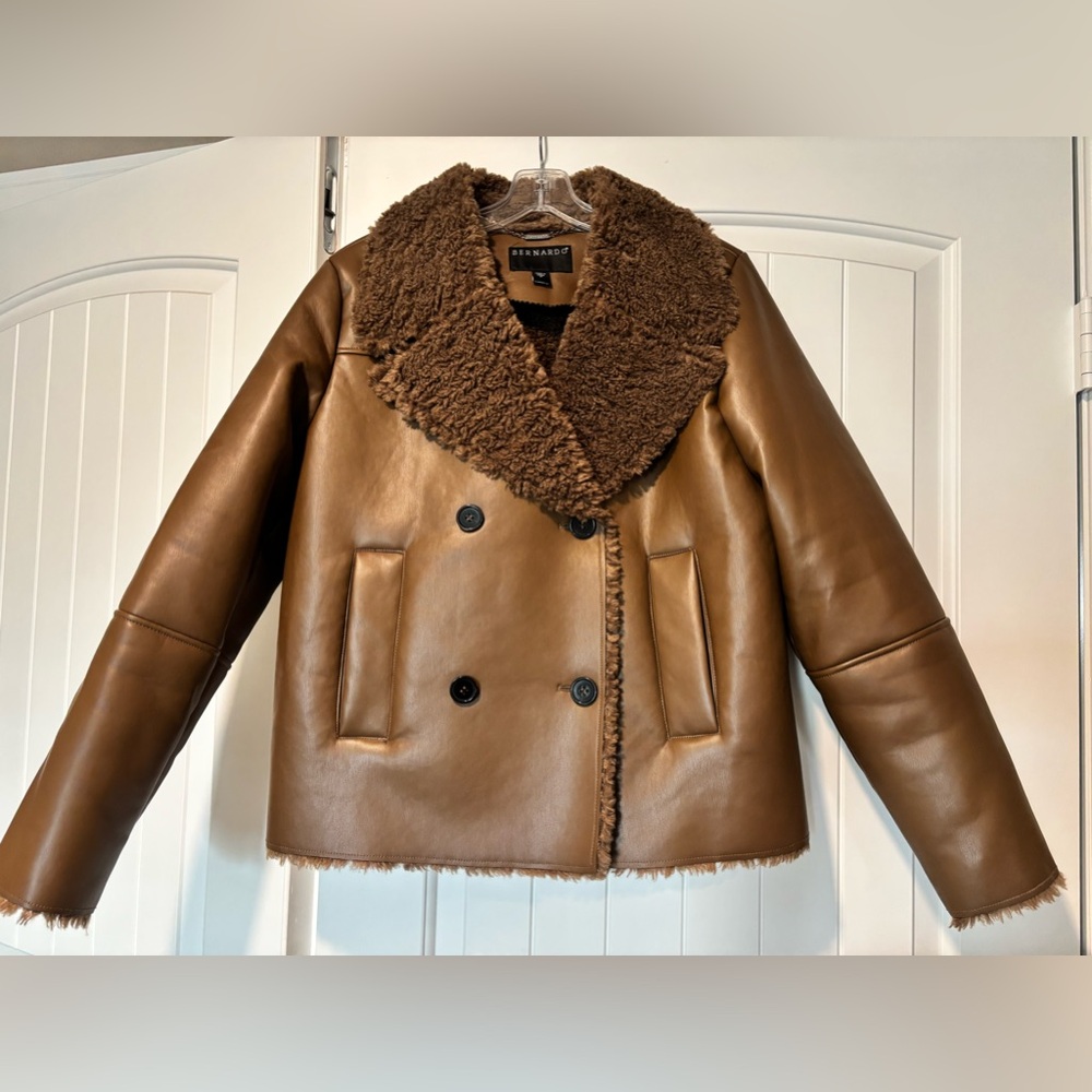 Bernardo faux leather and shearling double breasted coat.